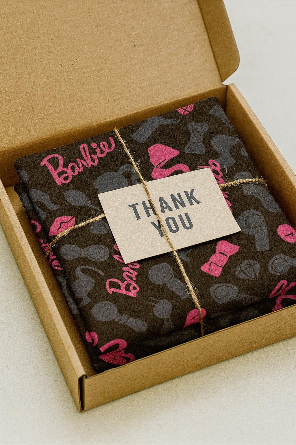 Barbie Fabric: Pink Logo Text, Black Linen-Look Polyester, 44" Wide