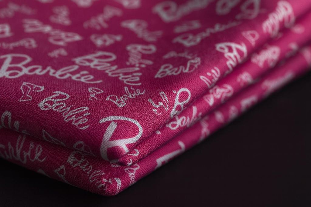 Barbie Fabric: Hot Pink Logo Text, Pink Linen-Look Polyester, 44" Wide